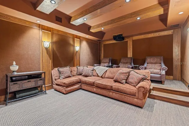 a room with pool table and large windows