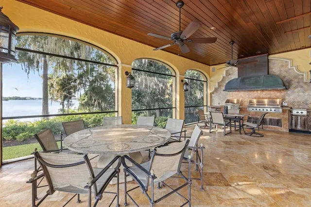 a view of a swimming pool with a patio