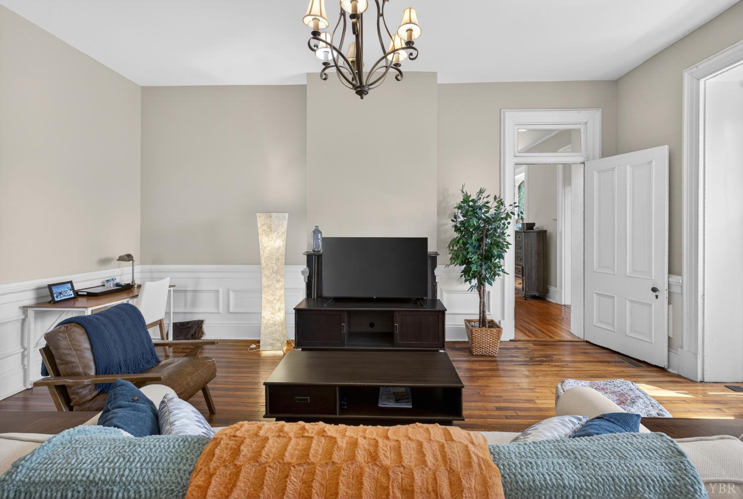 1007 Court Street Lynchburg, VA 24504 - Photo 19 of 90 a living room with furniture and a flat screen tv