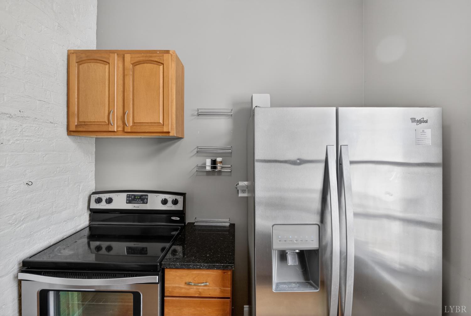 1007 Court Street Lynchburg, VA 24504 - Photo 22 of 90 a kitchen with a refrigerator and a stove
