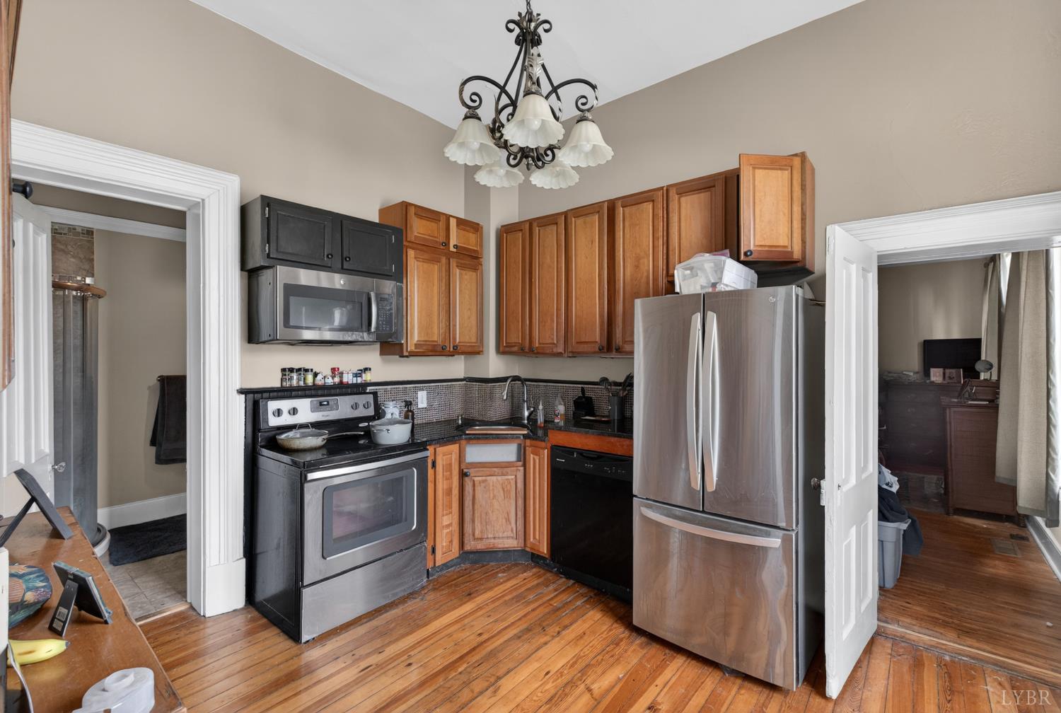 1007 Court Street Lynchburg, VA 24504 - Photo 45 of 90 a kitchen with stainless steel appliances granite countertop a refrigerator a stove top oven a sink and dishwasher