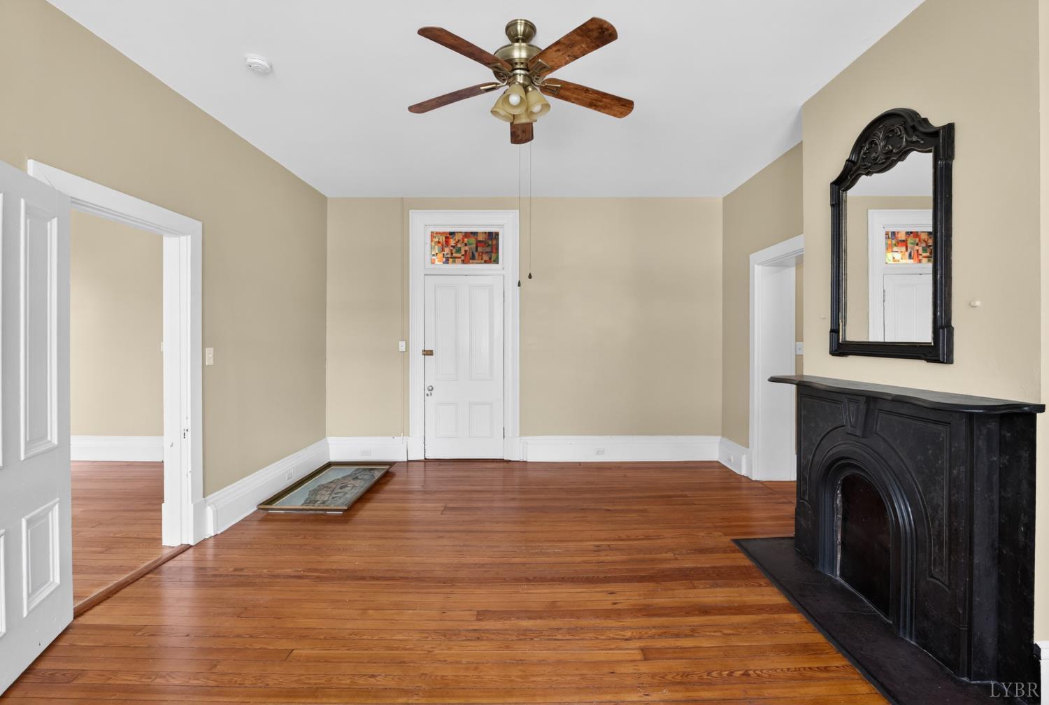 1007 Court Street Lynchburg, VA 24504 - Photo 56 of 90 a view of livingroom with hardwood floor and a ceiling fan