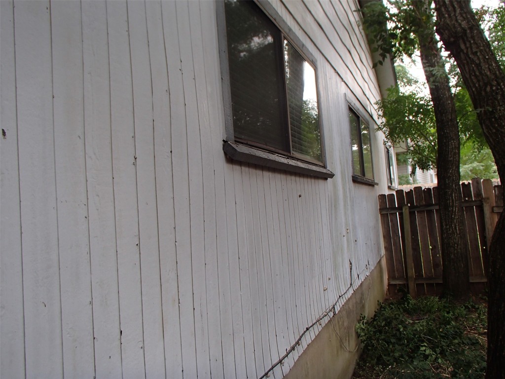 617 Luther Drive, Unit B Georgetown, TX 78628 - Photo 12 of 13 a view of a house with a wooden door and deck