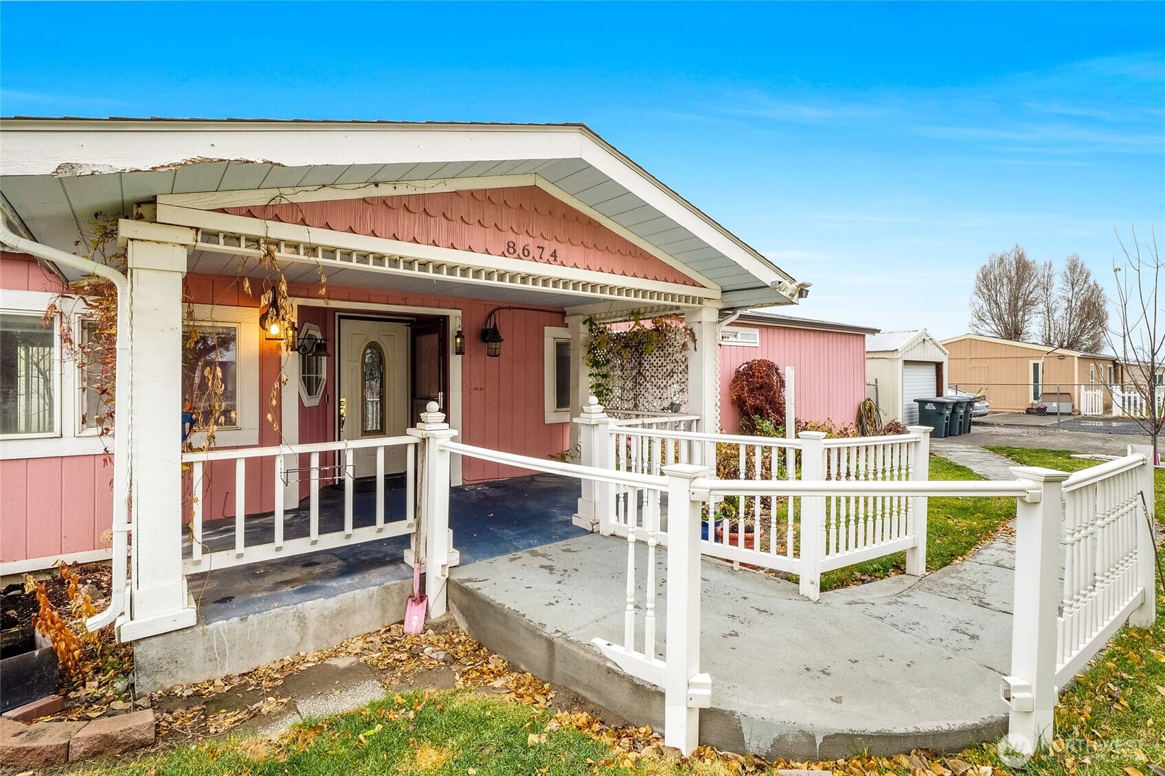 8674 Vince Road Northeast Moses Lake, WA 98837 - Photo 6 of 39 a front view of a house with a porch