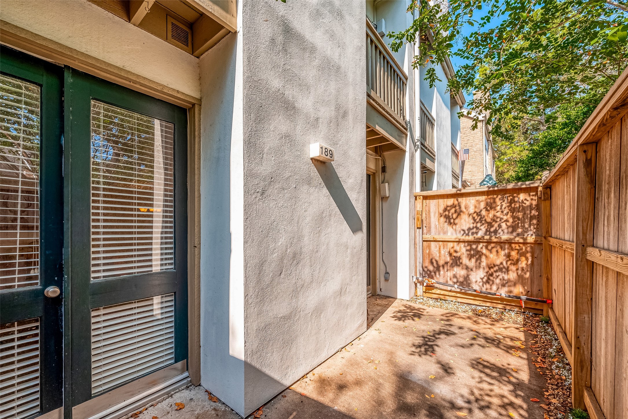 2100 Tanglewilde Street, Unit 189 Houston, TX 77063 - Photo 30 of 31 Private patio with French doors