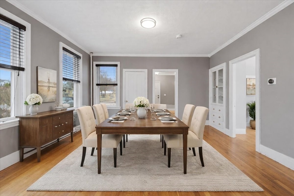 163 West Central Street Franklin, MA 02038 - Photo 17 of 39 a view of a a dining room with furniture window and wooden floor