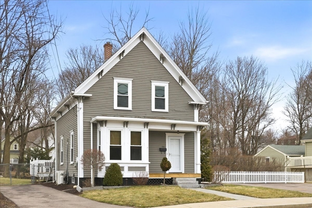 163 West Central Street Franklin, MA 02038 - Photo 2 of 39 a view of a yard in front of a house