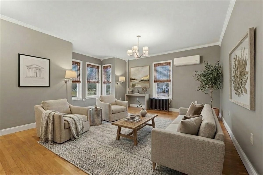 163 West Central Street Franklin, MA 02038 - Photo 21 of 39 a living room with furniture and a large window