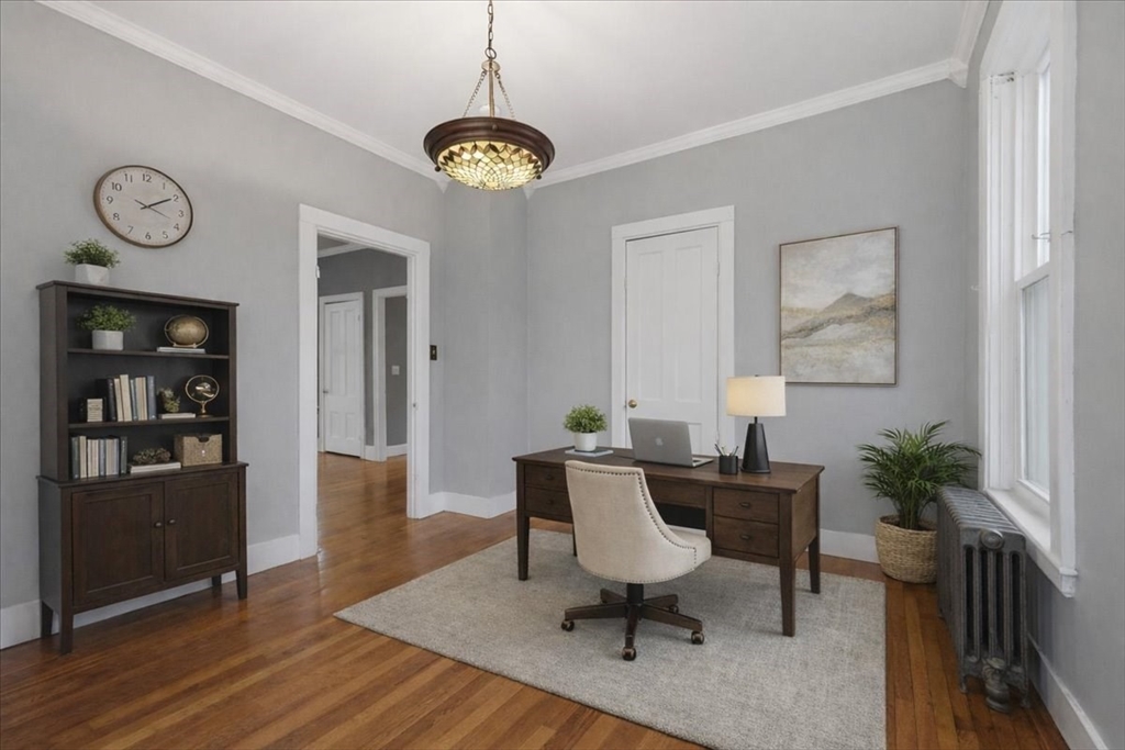 163 West Central Street Franklin, MA 02038 - Photo 24 of 39 a view of a dining room with furniture wooden floor and a chandelier