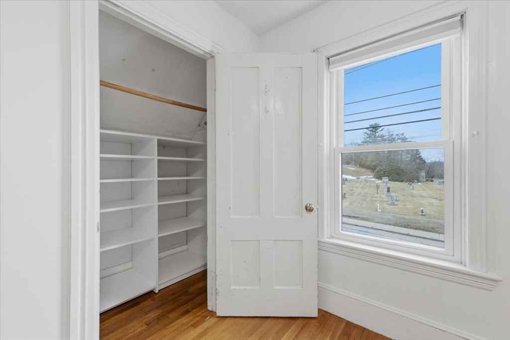 163 West Central Street Franklin, MA 02038 - Photo 35 of 39 a view of a hallway with wooden floor and closet