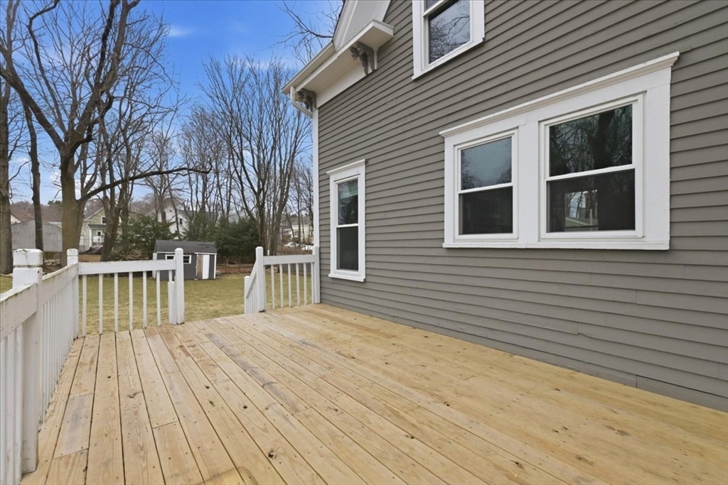 163 West Central Street Franklin, MA 02038 - Photo 7 of 39 a view of a house with pool and trees