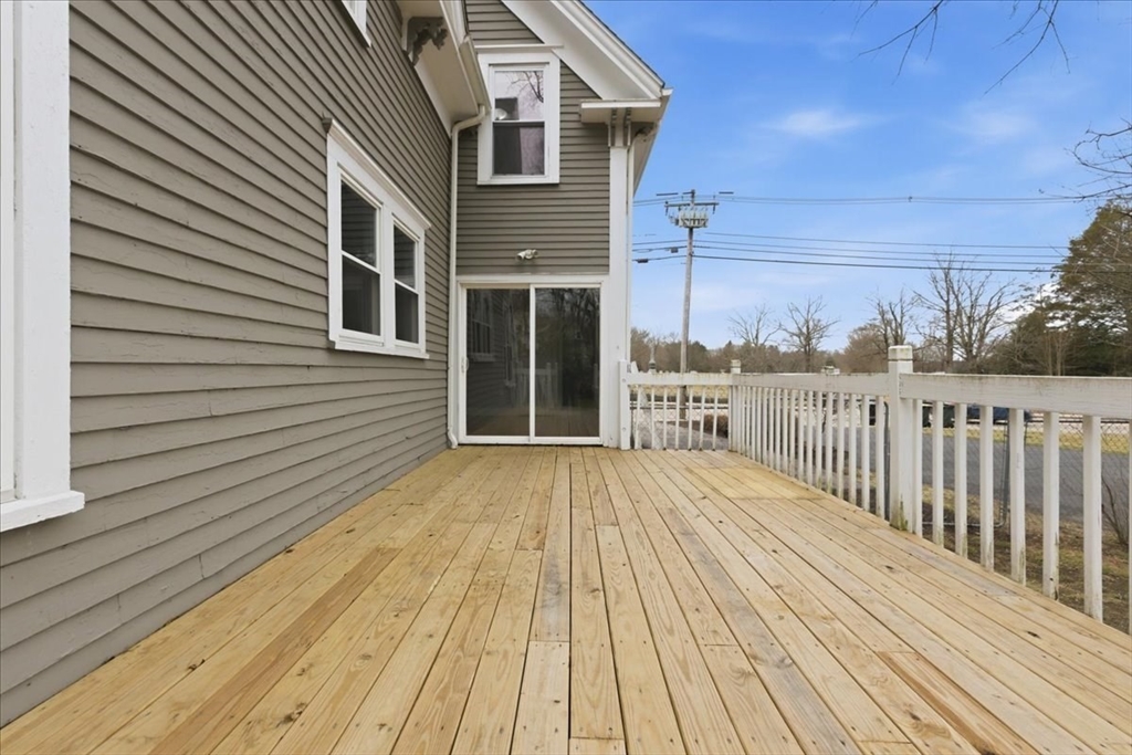 163 West Central Street Franklin, MA 02038 - Photo 9 of 39 a view of a house with wooden floor