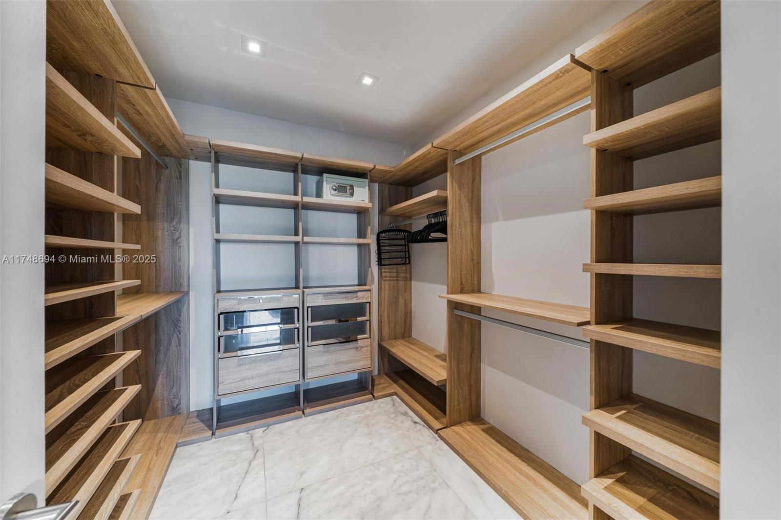 1201 20th Street, Unit PH02 Miami Beach, FL 33139 - Photo 18 of 39 primary closet