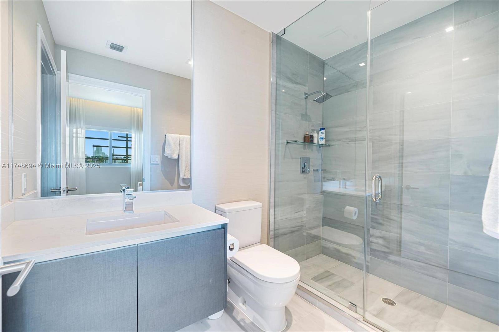 1201 20th Street, Unit PH02 Miami Beach, FL 33139 - Photo 21 of 39 guest bedroom bath