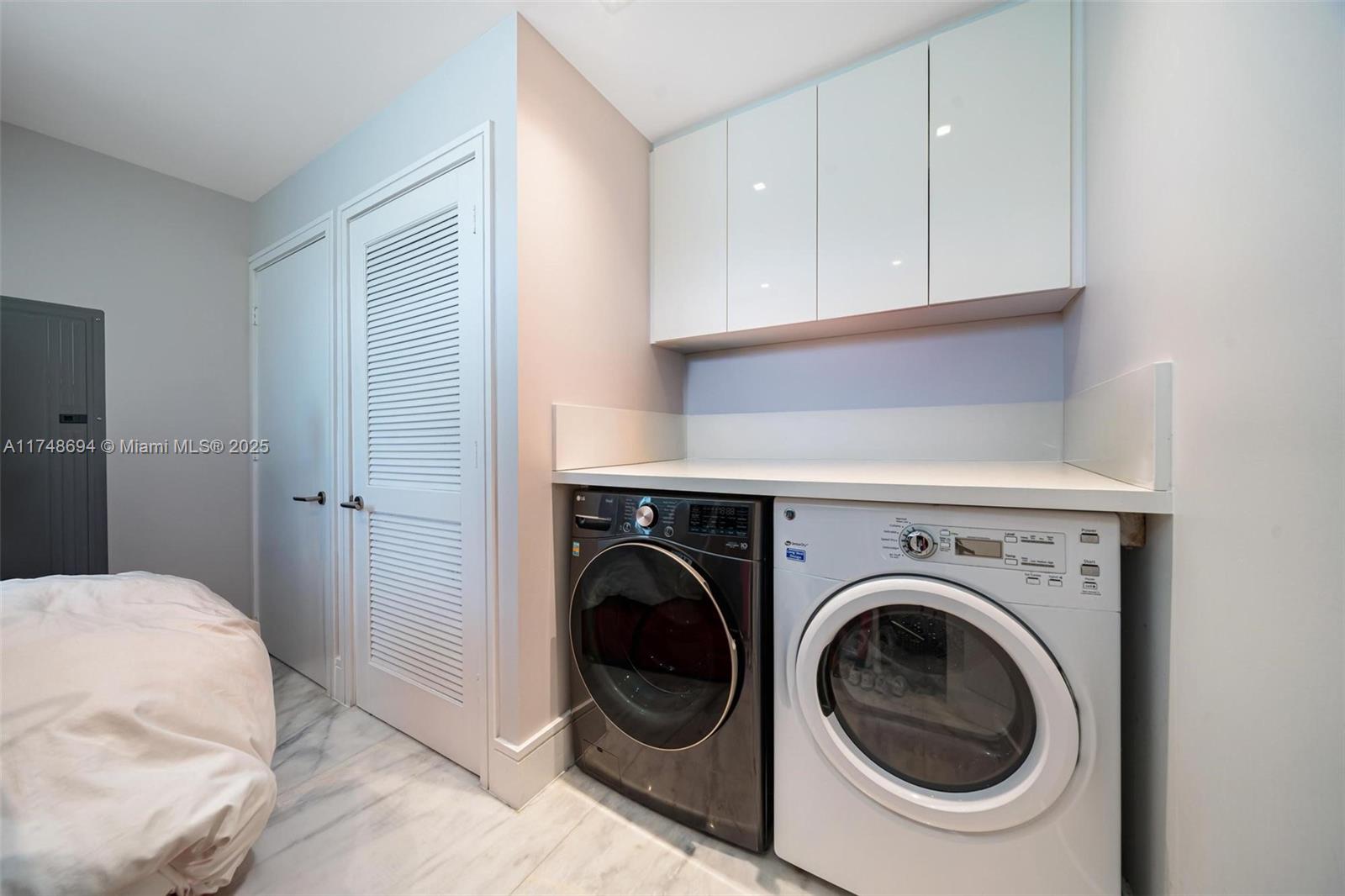 1201 20th Street, Unit PH02 Miami Beach, FL 33139 - Photo 22 of 39 laundry