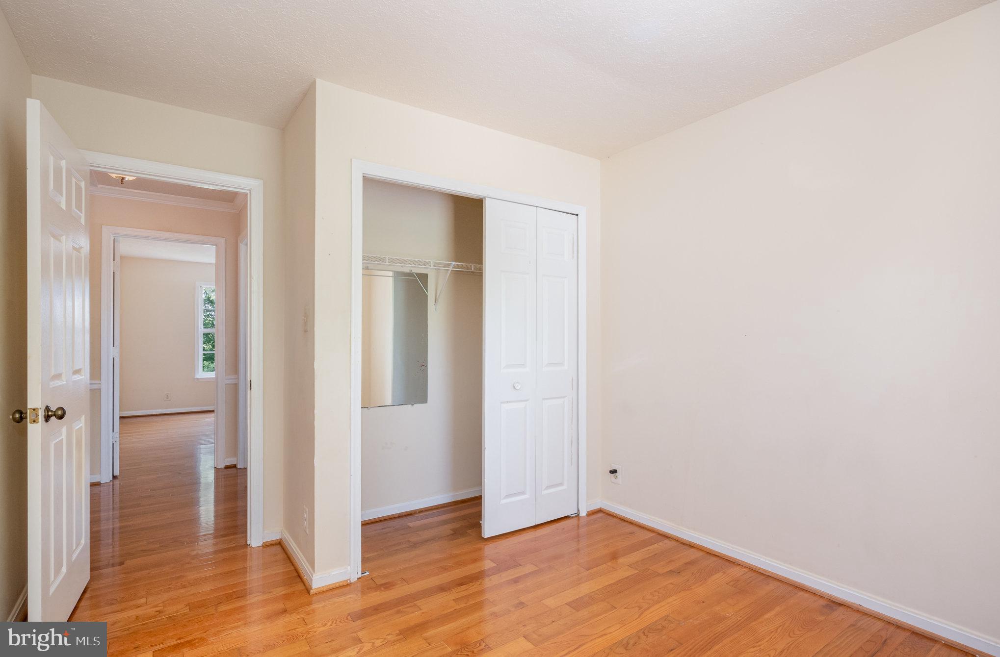 10402 Labrador Loop Manassas, VA 20112 - Photo 24 of 44 an empty room with wooden floor