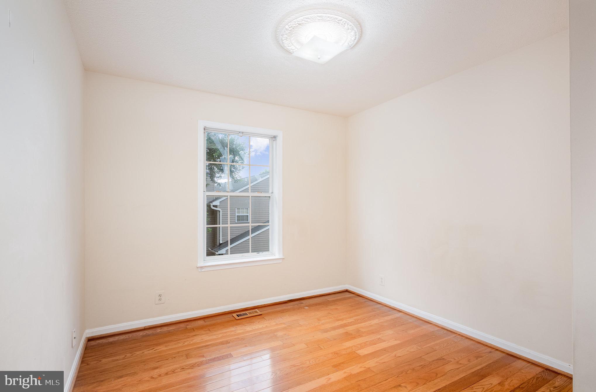 10402 Labrador Loop Manassas, VA 20112 - Photo 27 of 44 an empty room with a window