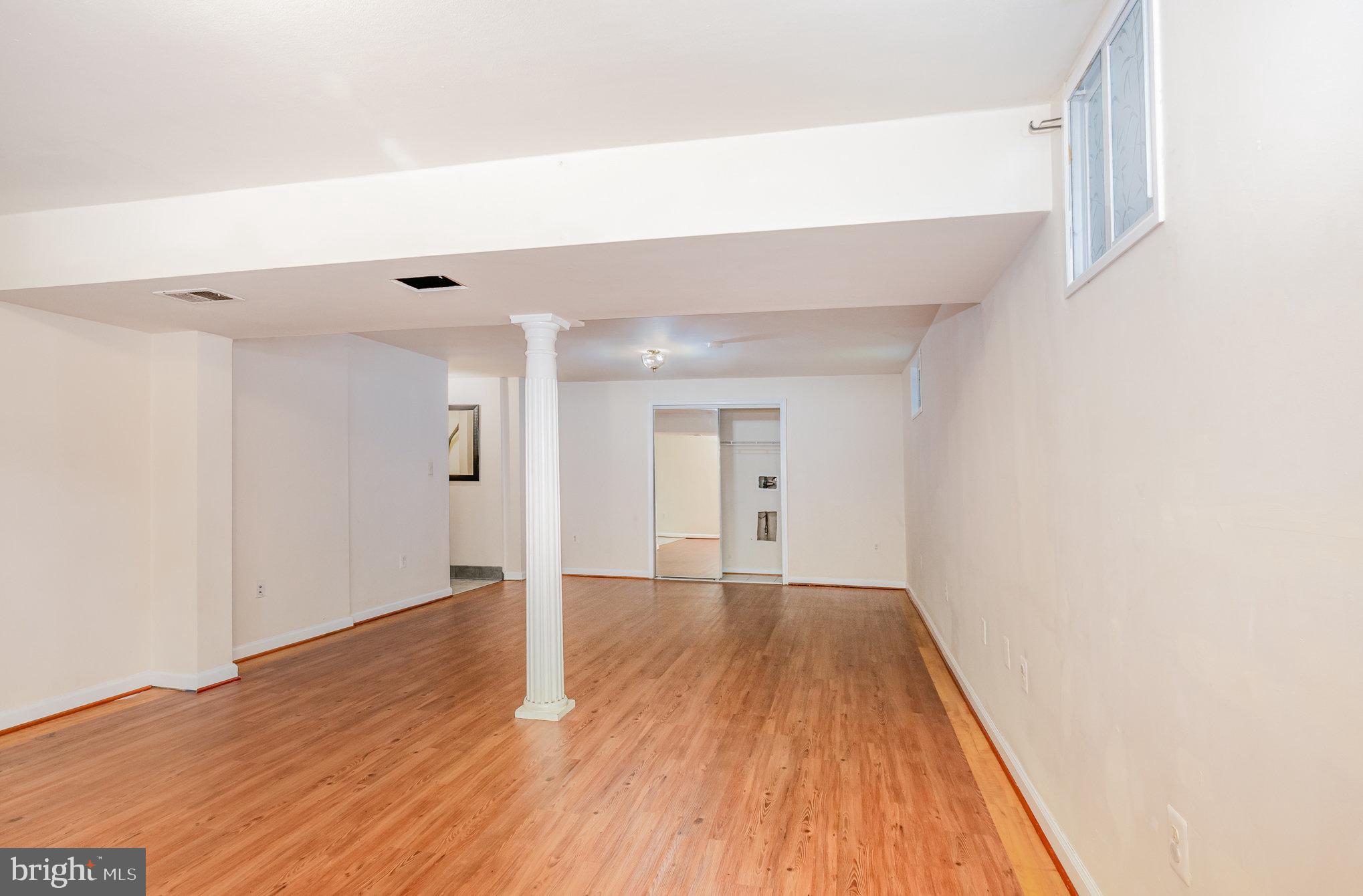 10402 Labrador Loop Manassas, VA 20112 - Photo 36 of 44 a view of a room with wooden floor