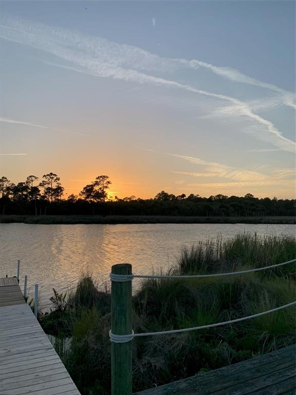 105 Bridle Ridge Court Flagler Beach, FL 32136 - Photo 7 of 8 a view of a lake next to a lake