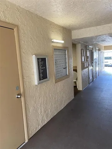 a view of hallway with livingroom