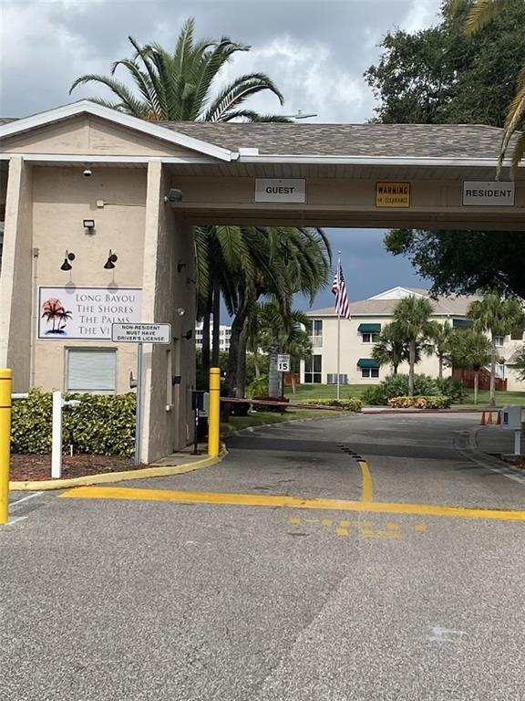 10033 64th Avenue North, Unit 1 St. Petersburg, FL 33708 - Photo 23 of 26 a view of swimming pool with outdoor seating