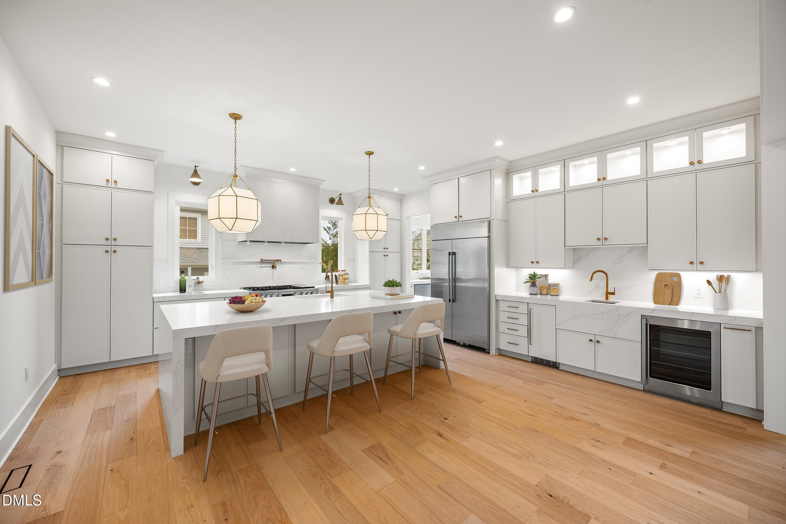 2817 Claremont Road Raleigh, NC 27608 - Photo 18 of 73 a large kitchen with kitchen island a white cabinets and stainless steel appliances