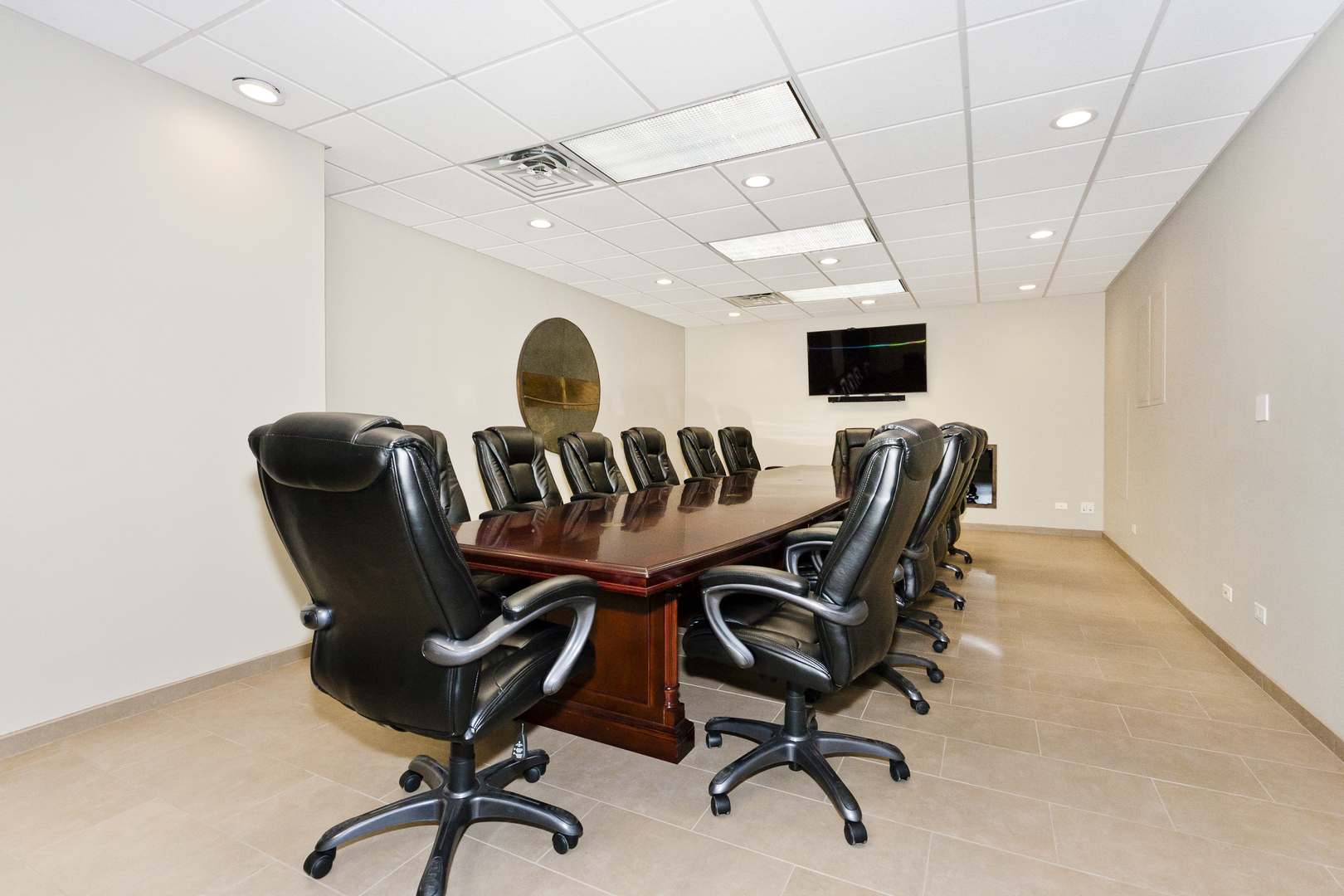 1030 North State Street, Unit 23F Chicago, IL 60610 - Photo 13 of 13 a view of a workspace with furniture and a window