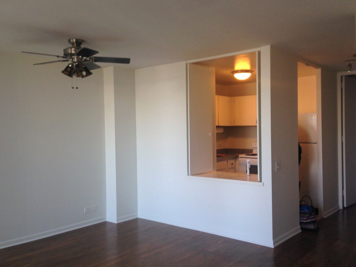 1030 North State Street, Unit 23F Chicago, IL 60610 - Photo 7 of 13 a view of a hallway with closet and a bathroom