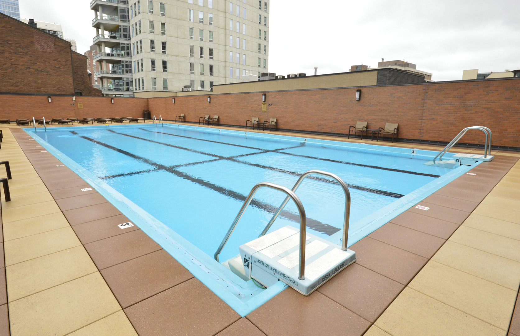 1030 North State Street, Unit 23F Chicago, IL 60610 - Photo 10 of 13 a view of swimming pool with a terrace