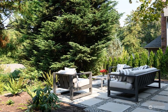 a view of a car park in front of house