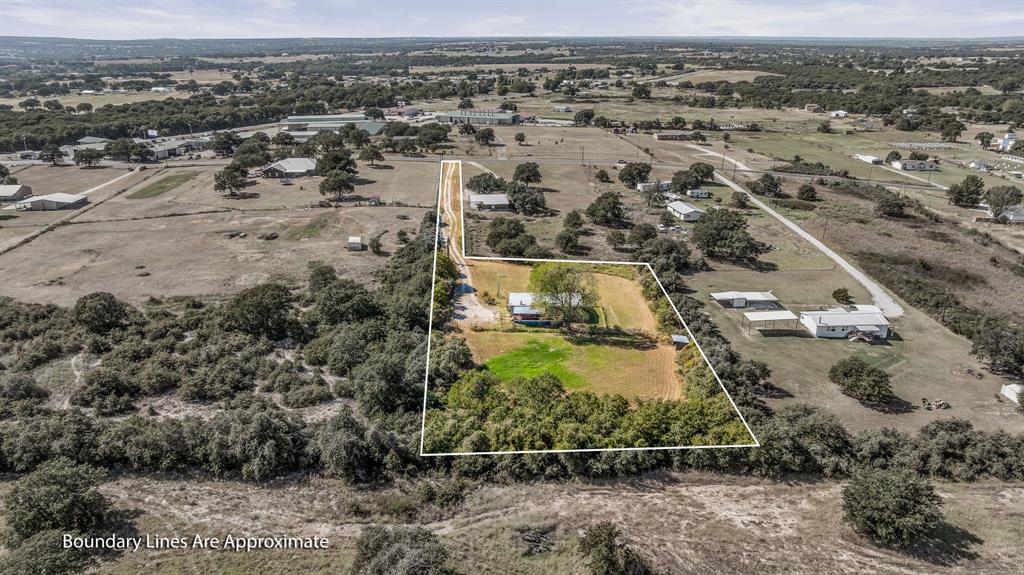 192 Big Salty Lane Springtown, TX 76082 - Photo 1 of 1 an aerial view of residential houses with outdoor space