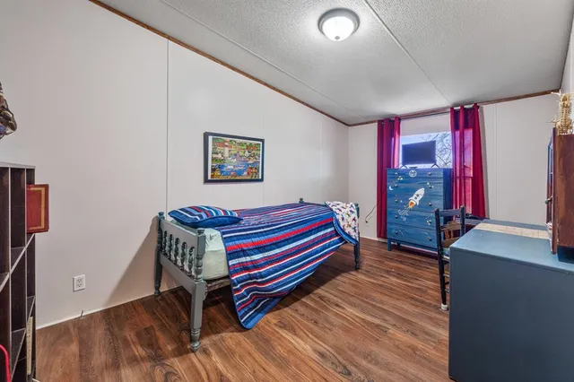 a room with furniture and a window