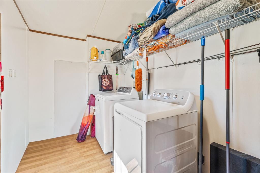 192 Big Salty Lane Springtown, TX 76082 - Photo 24 of 36 a utility room with dryer and washer