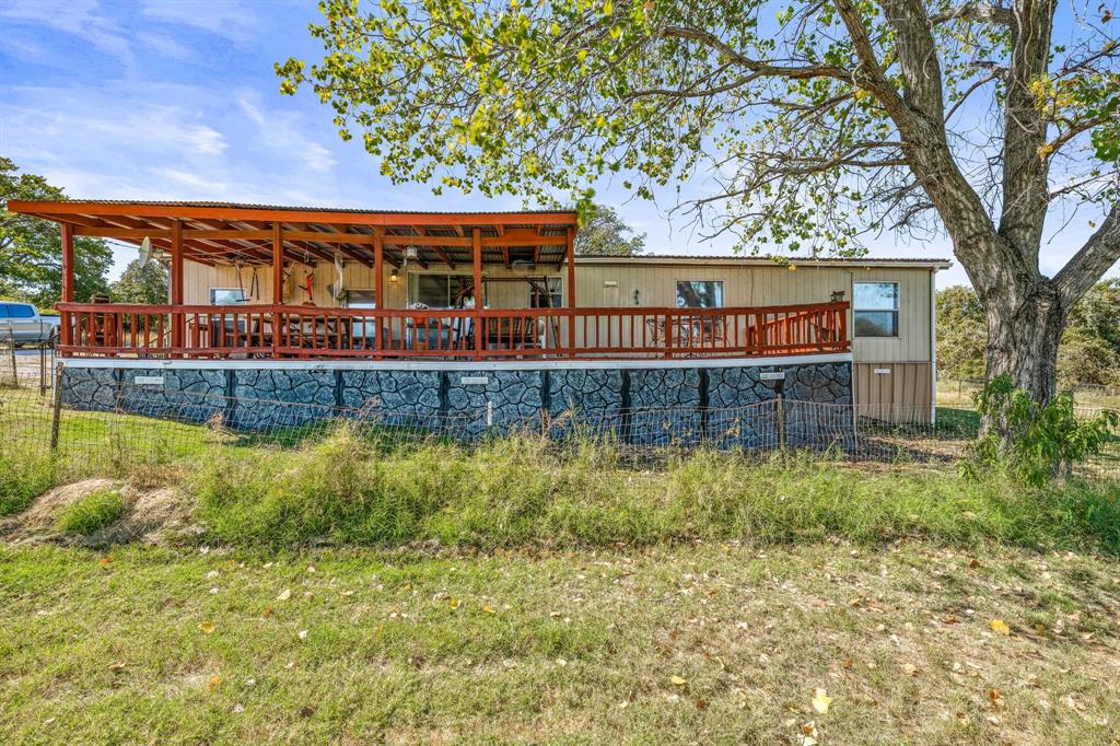 192 Big Salty Lane Springtown, TX 76082 - Photo 28 of 36 a view of a house with swimming pool
