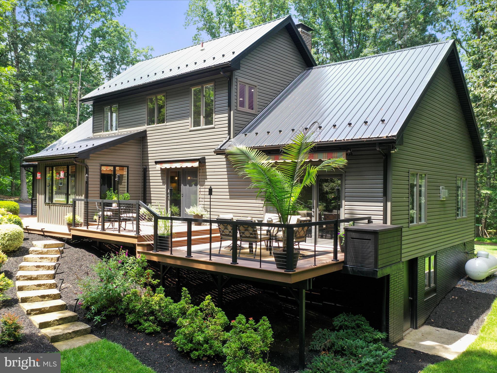 3953 West Weaver Road Greencastle, PA 17225 - Photo 4 of 61 Private Trek Deck with cable railing & 3 awnings