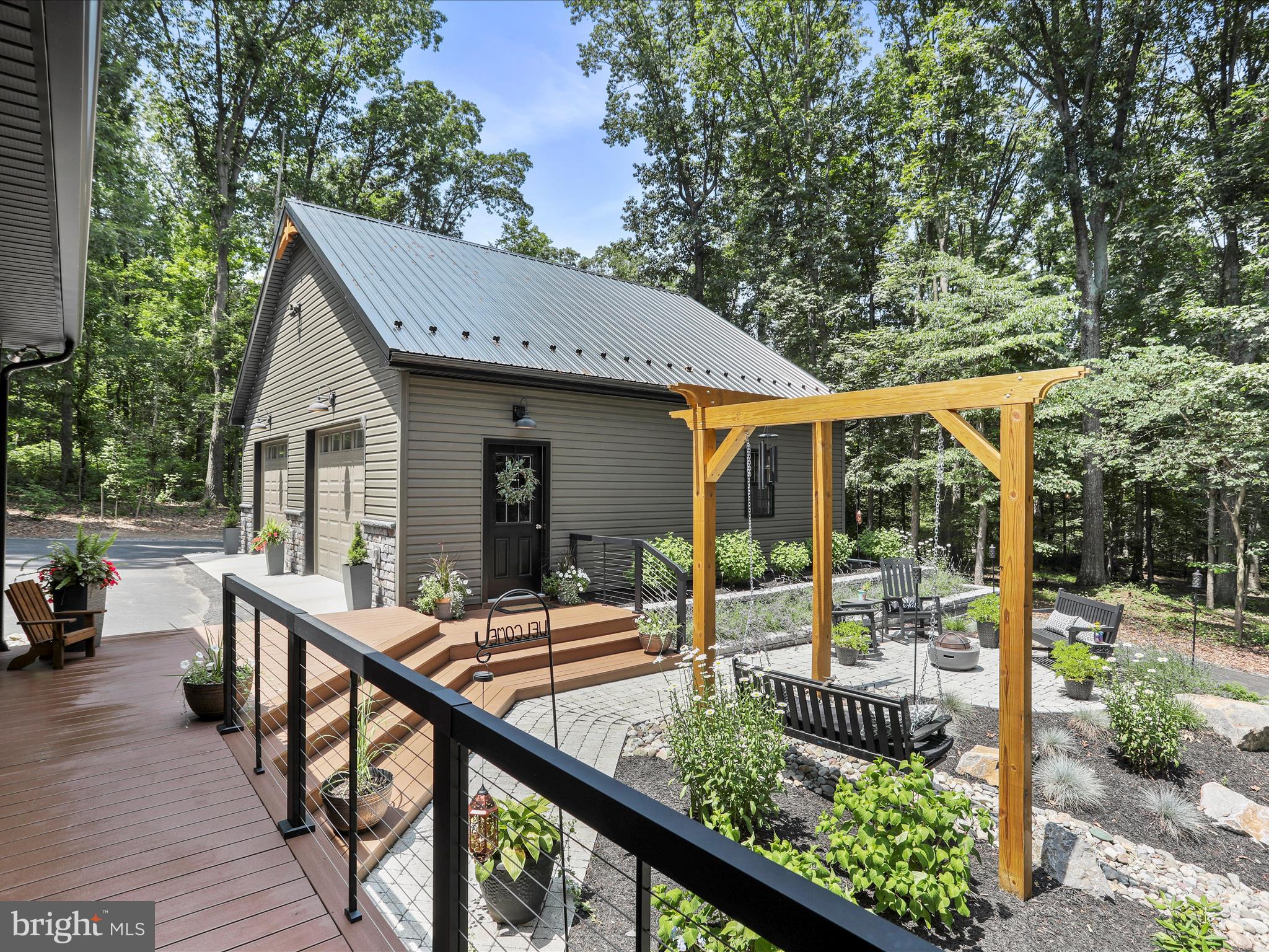 3953 West Weaver Road Greencastle, PA 17225 - Photo 48 of 61 Rear yard, trek deck and hardscape with swing