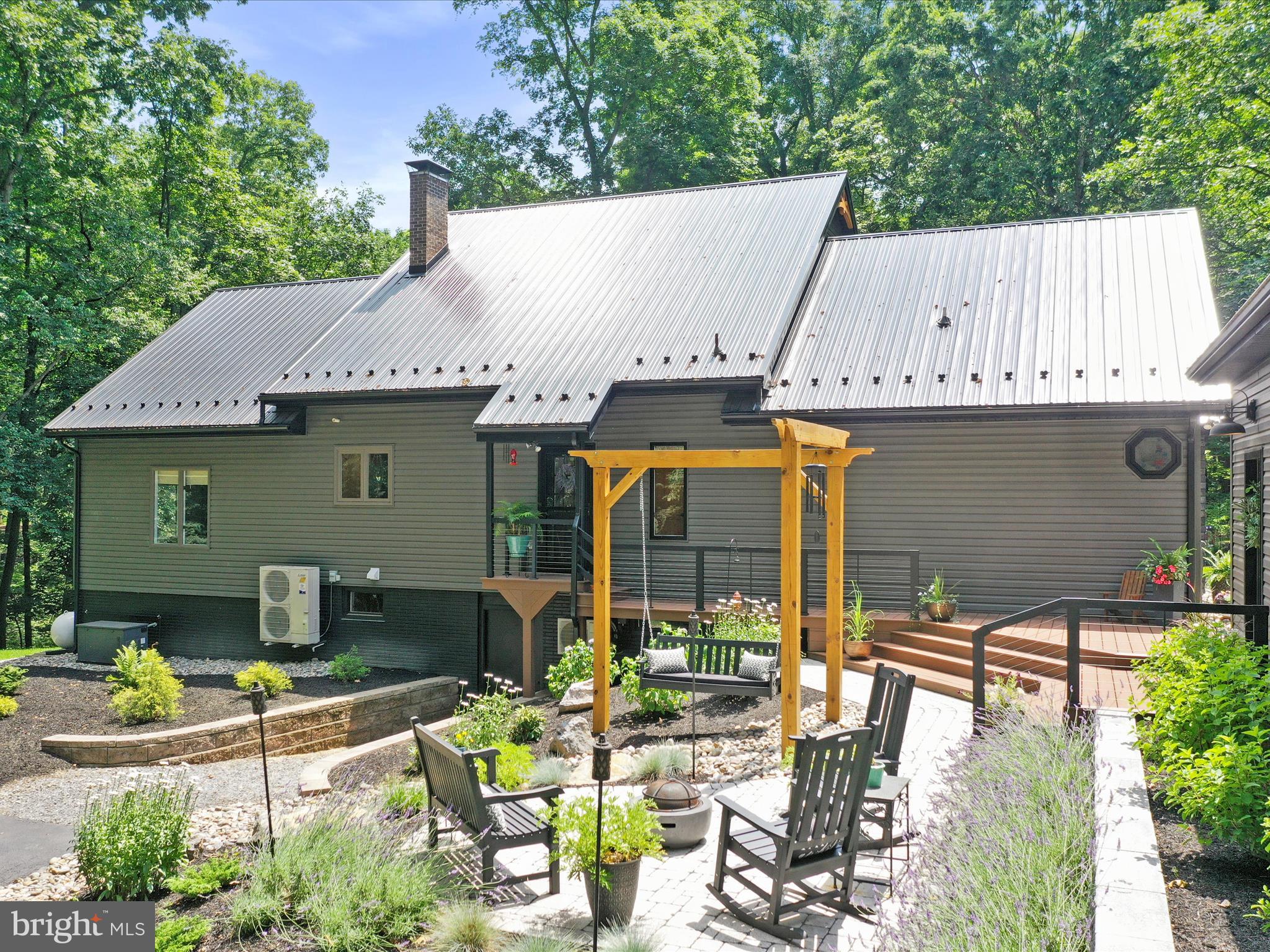 3953 West Weaver Road Greencastle, PA 17225 - Photo 51 of 61 Patio with firepit and swing