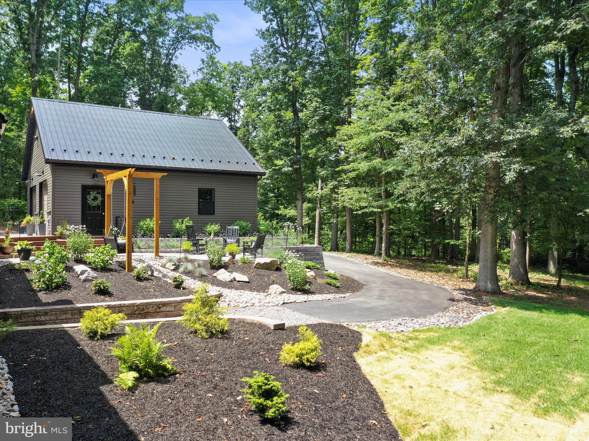 3953 West Weaver Road Greencastle, PA 17225 - Photo 52 of 61 Rear yard w/hardscape and driveway to lower level