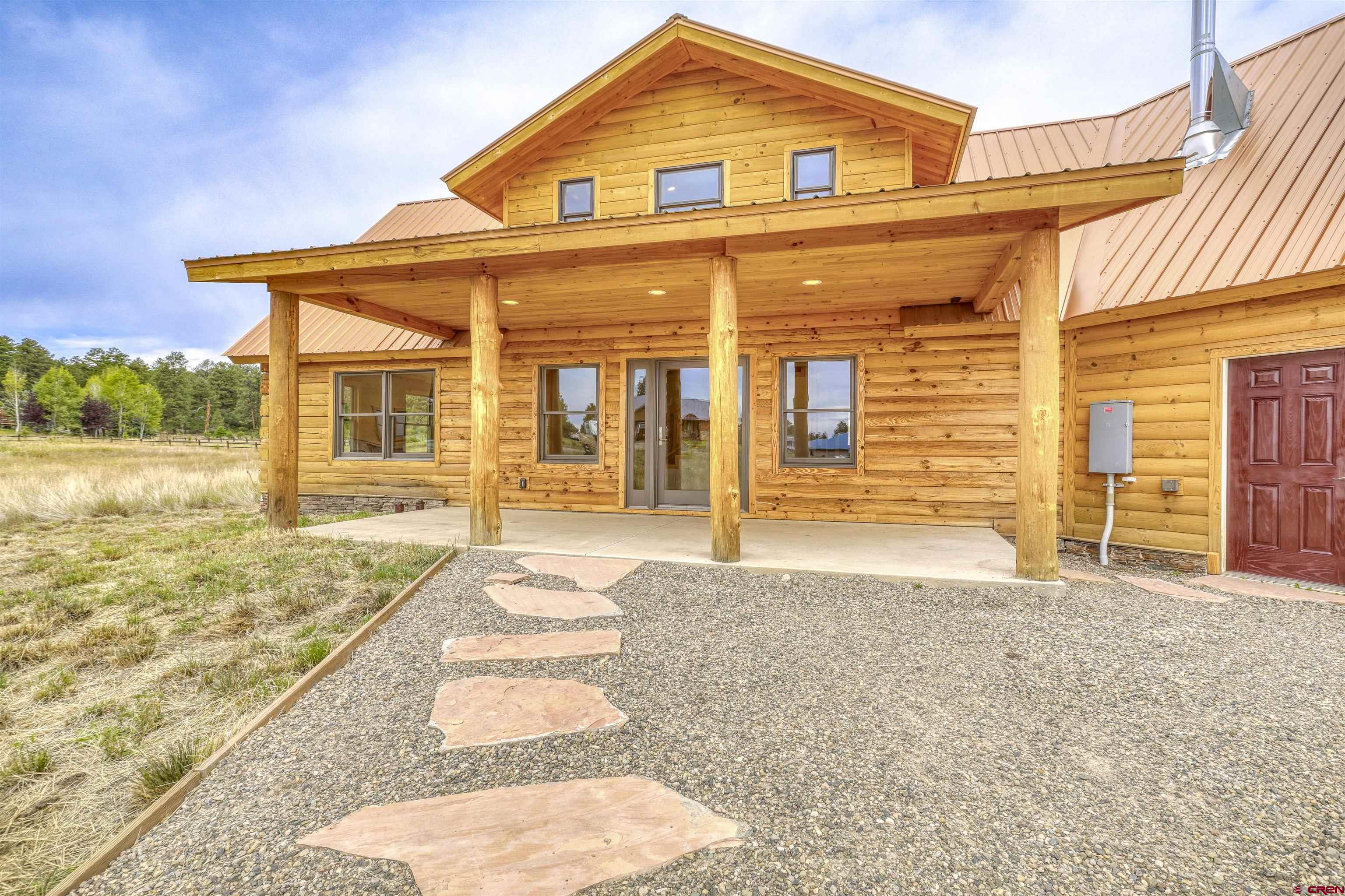 159 Snow Circle Pagosa Springs, CO 81147 - Photo 2 of 45 front view of a house