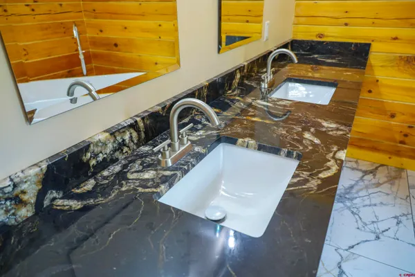 a view of a bathtub in a bathroom