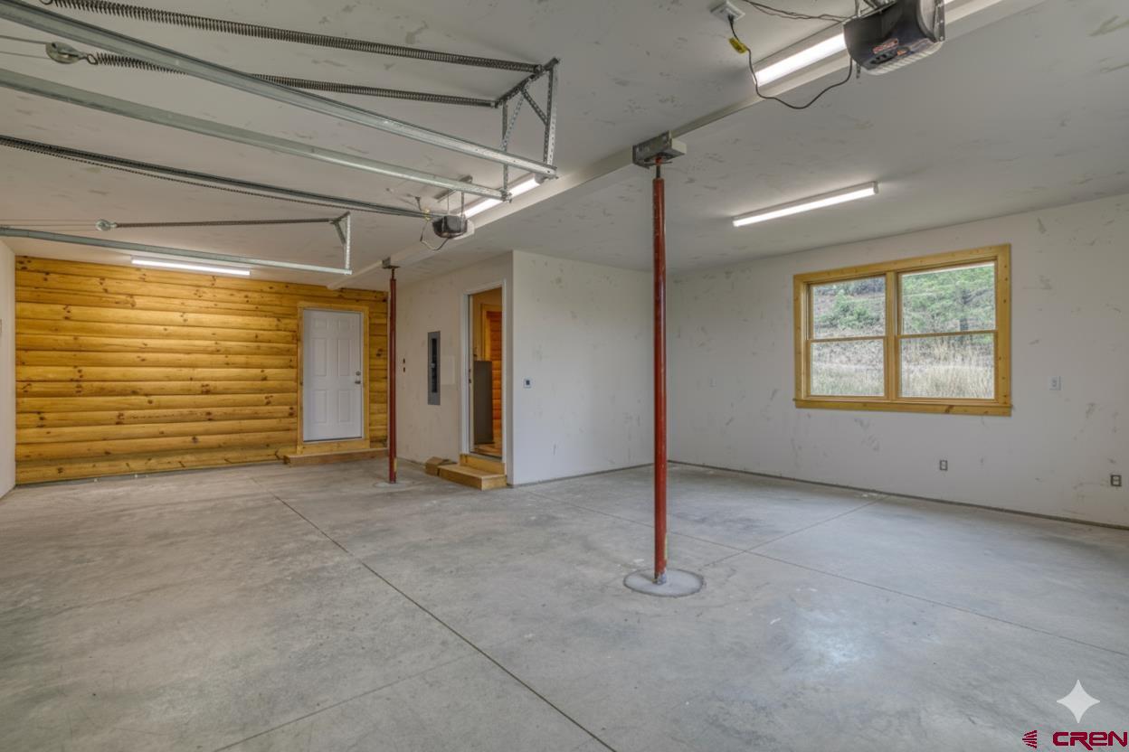 159 Snow Circle Pagosa Springs, CO 81147 - Photo 40 of 45 a view of an empty room with a window