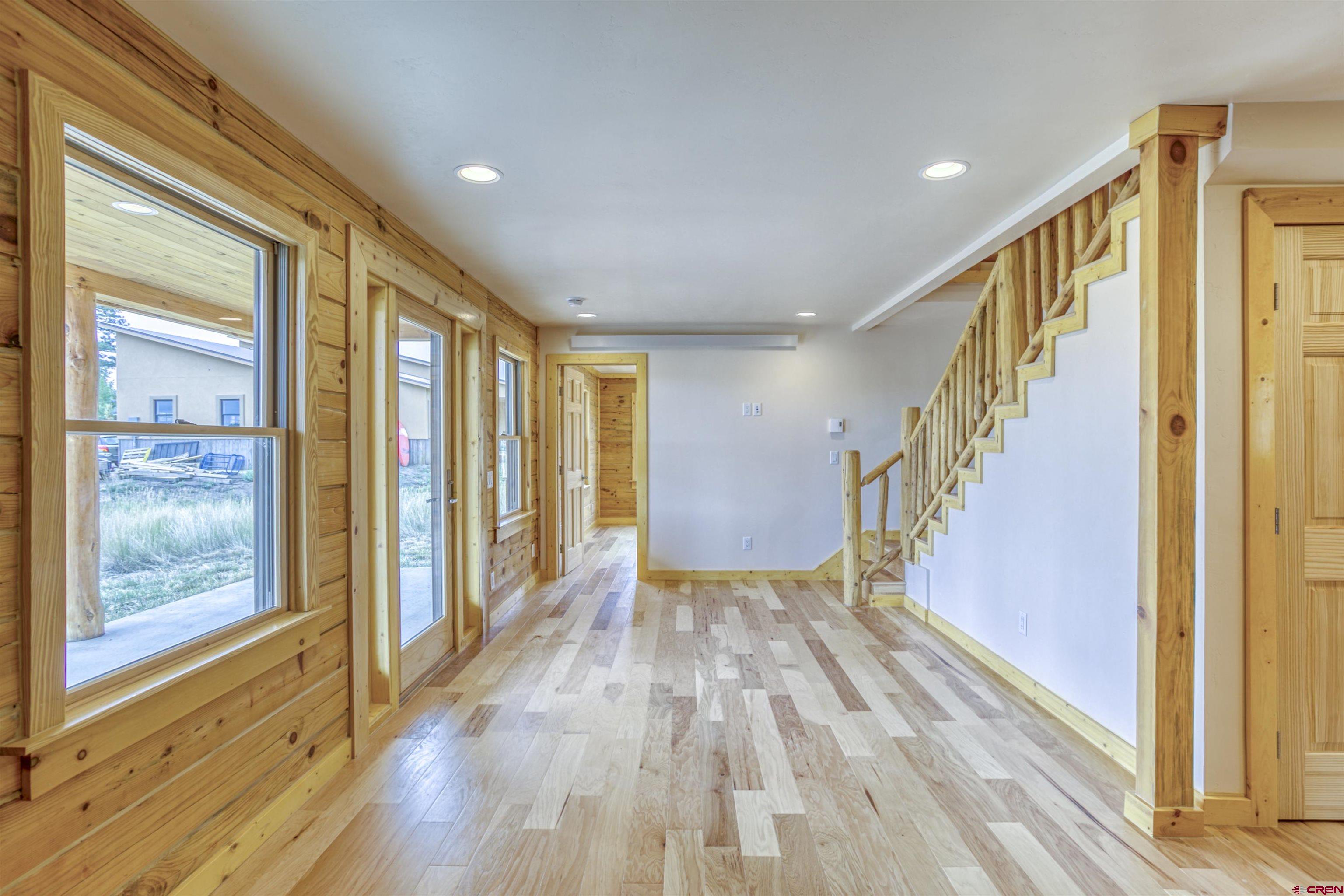 159 Snow Circle Pagosa Springs, CO 81147 - Photo 41 of 45 a view of an entryway with wooden floor and door