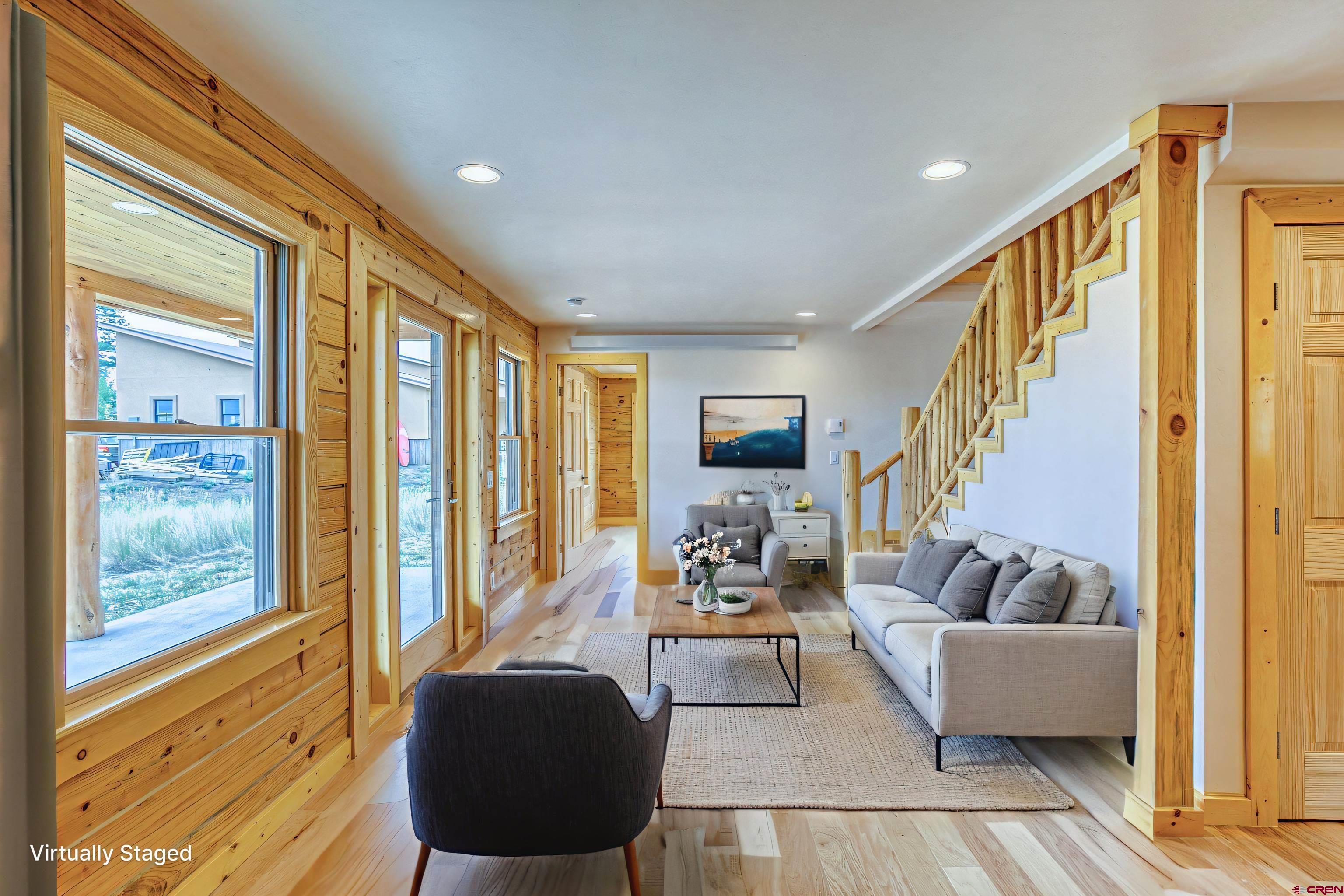159 Snow Circle Pagosa Springs, CO 81147 - Photo 42 of 45 a living room with furniture and a large window
