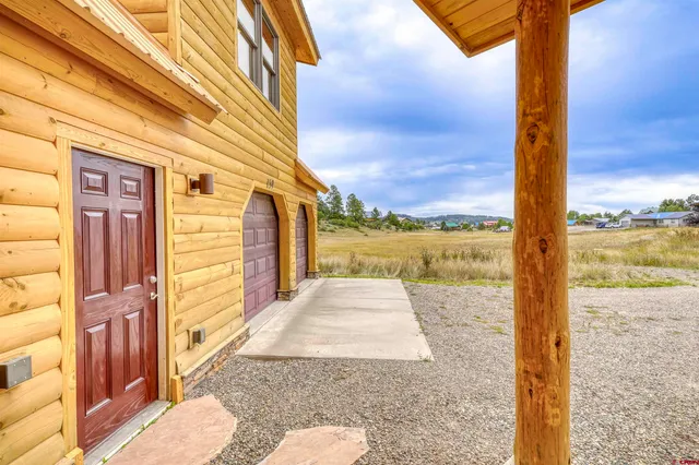 a view of a street with an ocean view