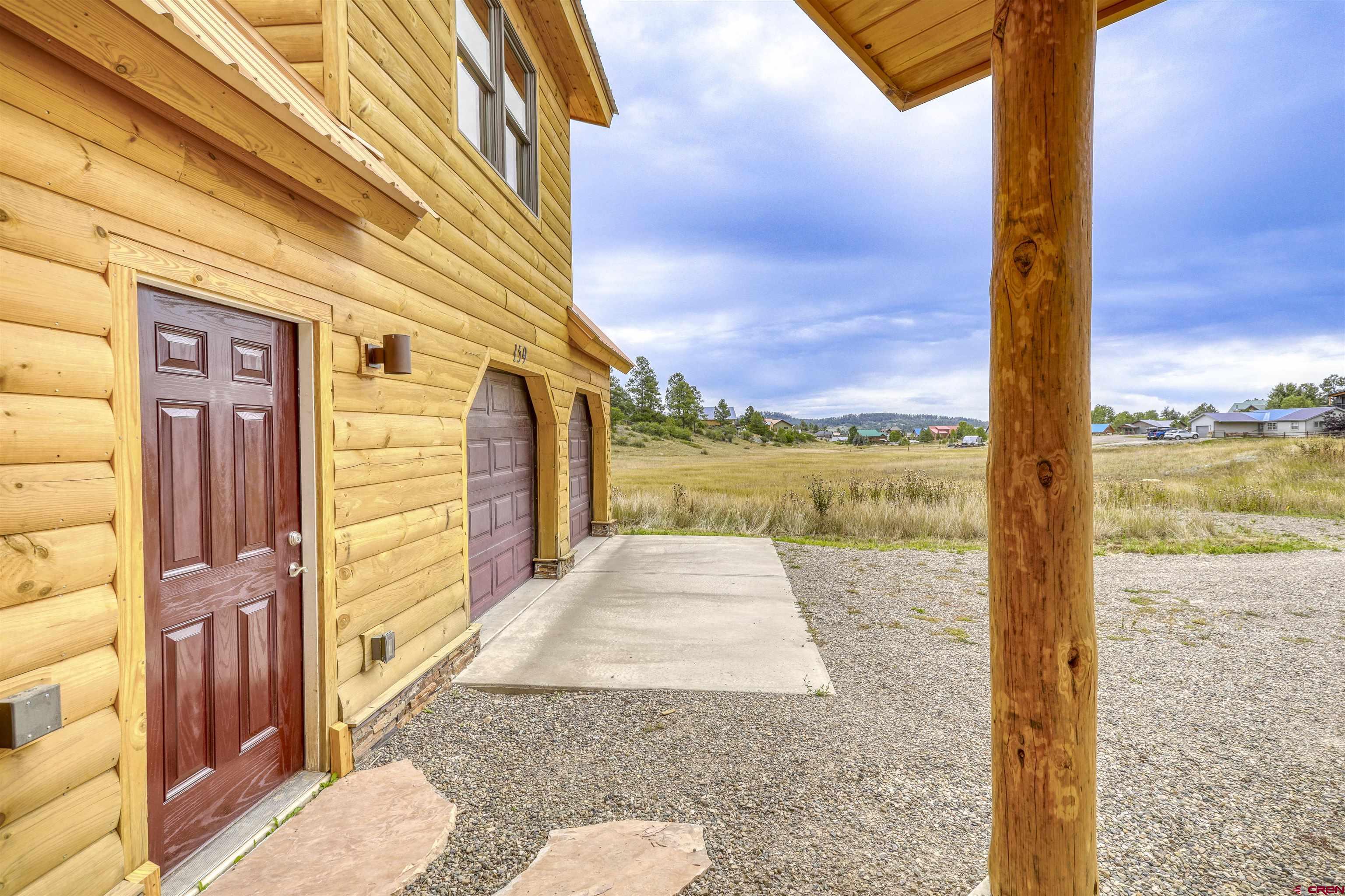 159 Snow Circle Pagosa Springs, CO 81147 - Photo 7 of 45 a view of a street with an ocean view