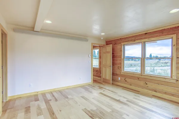 a view of an empty room and window