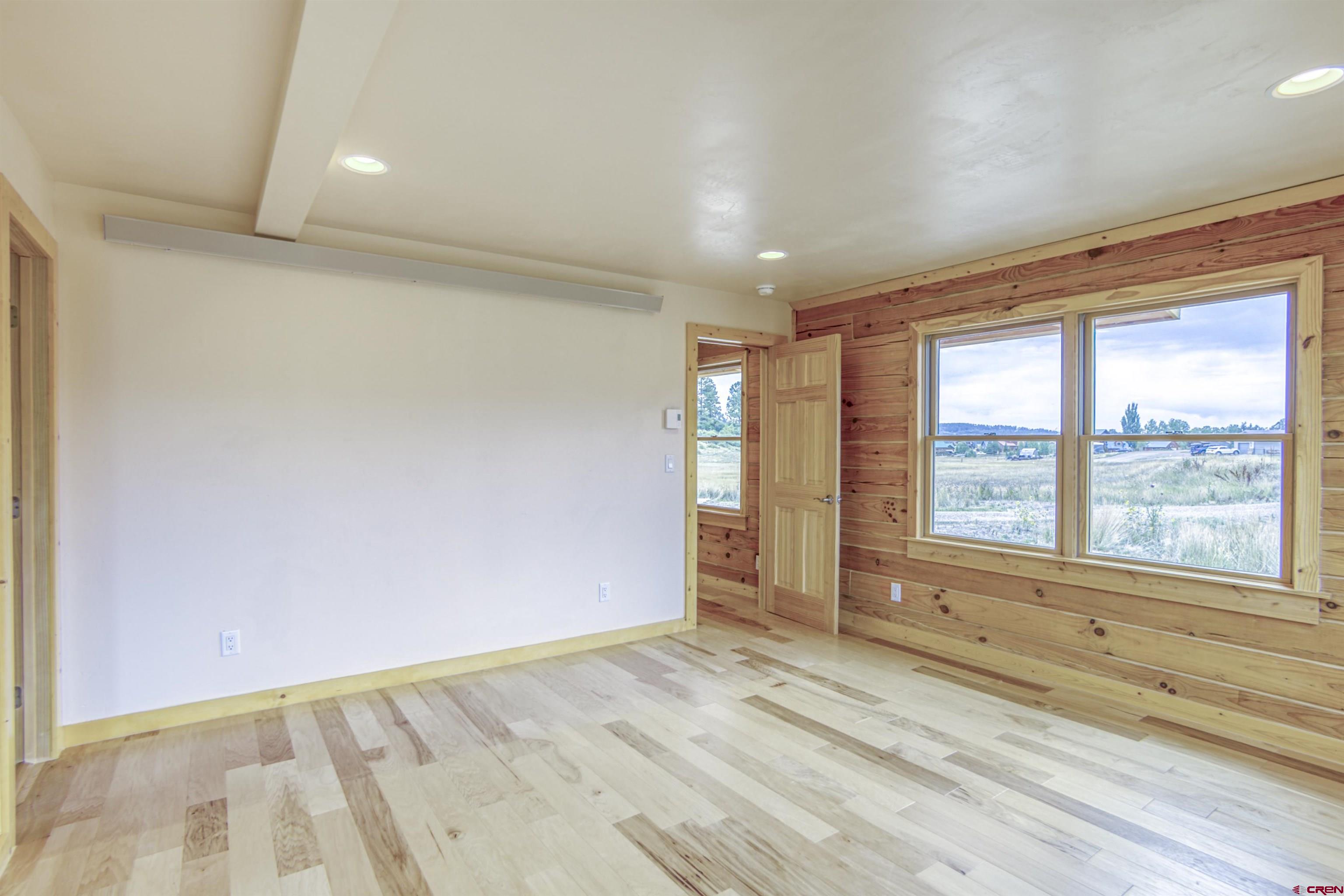 159 Snow Circle Pagosa Springs, CO 81147 - Photo 8 of 45 a view of an empty room and window