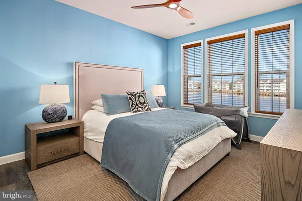 a workspace with furniture window and wooden floor