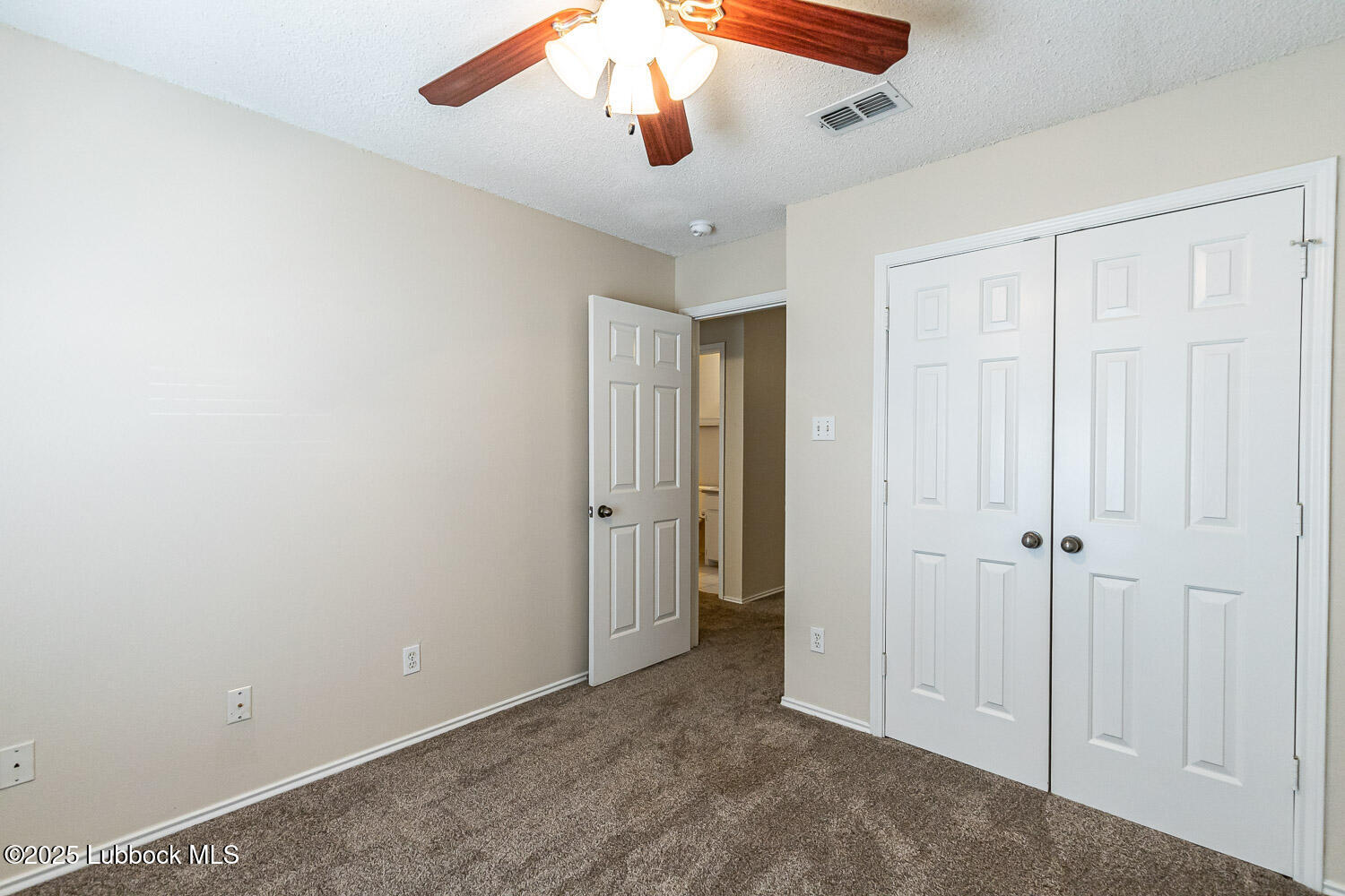 6120 7th Drive Lubbock, TX 79416 - Photo 21 of 33 wooden floor in an empty room