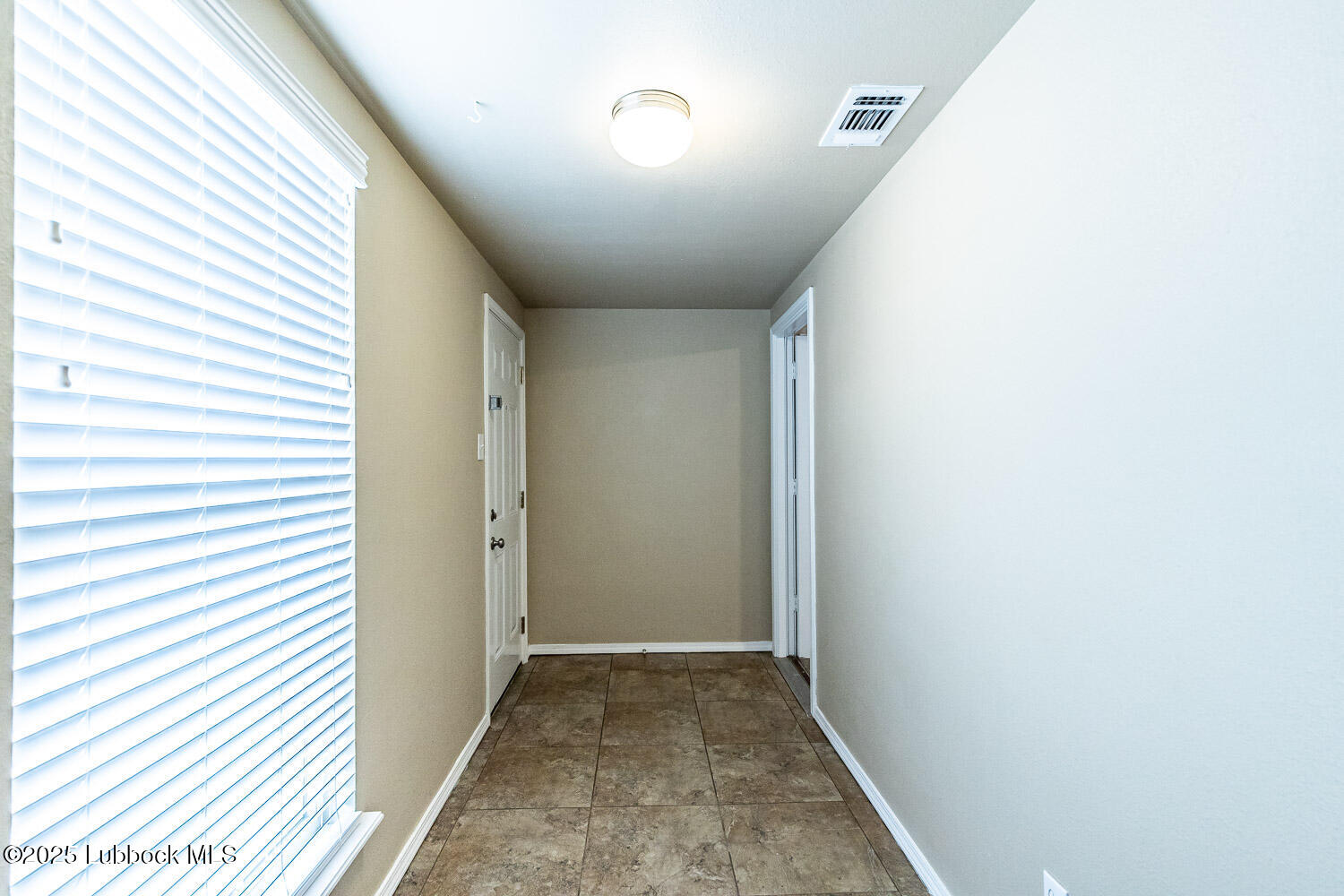 6120 7th Drive Lubbock, TX 79416 - Photo 27 of 33 a view of a hallway